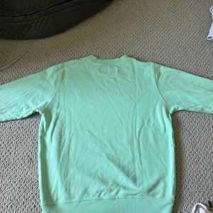 Golf crew neck sweatshirt. Men’s S women’s M. Loved it while I had it.